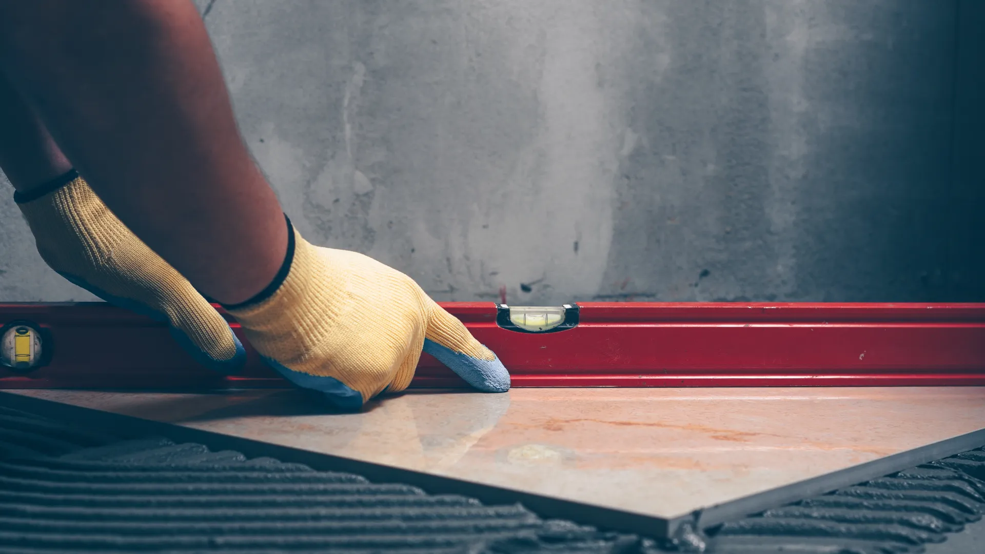 Precise tiling installation on bathroom walls and floors